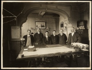 Group in drafting room, W. 6 mill. Reading from right to left - Mr. Schwarz, Hill, Benoit, Eichler, Perkins & Stevens