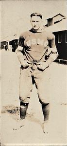 U.S. Marine in football uniform with USMC on jersey at U.S. Marine base Quantico, VA
