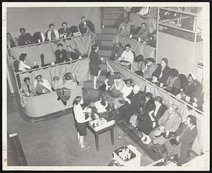 Now I Sit Me Down To Sleep - More than 1000 of the storm-bound were given refuge by the Peter Brigham Hospital during the storm, some of them in nurses' amphitheater. The hospital's samaritanism included coffee and cookies.