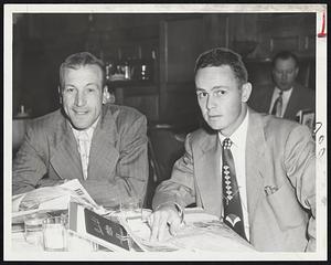 White Sox Hero-Nelson Fox (right), whose first major league home run defeated the Red Sox yesterday, dines with Catcher Phil Masi, former Butcher Boy of the Braves, before leaving for Fenway Park and today's game with the Red Sox.