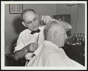 L-R - Manuel DeCosta, barber, & Cy Hyde at Hotel Tourant