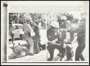 Clash Over Chicago Seven Conviction--UCLA campus policeman lies motionless after being felled during a student protest march in Los Angeles Thursday against the conviction of five of the Chicago Seven. Right, Los Angeles policemen use clubs to restrain a marcher who was in crowd that marched from UCLA campus down Westwood Blvd. to a shopping center where several picture windows were broken.