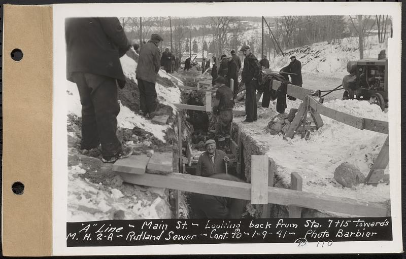 Contract No. 70, WPA Sewer Construction, Rutland, "A" line, Main Street, looking back from Sta. 7+15 towards manhole 2A, Rutland Sewer, Rutland, Mass., Jan. 9, 1941