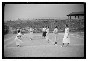 Women playing volleyball