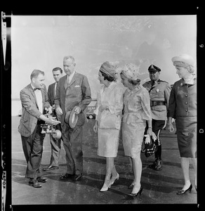 Lady Bird Johnson arriving at Logan Airport accompanied by Mary Collins and Toni Peabody