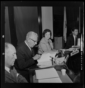Boston School Superintendent William H. Ohrenberger reading his report as Chairperson Louise Day Hicks looks on