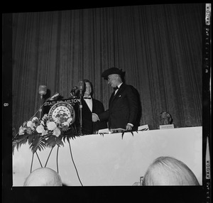 Governor Endicott Peabody and Vice President Lyndon B. Johnson in tricorn hat during Associated Industries of Massachusetts meeting at Statler Hilton