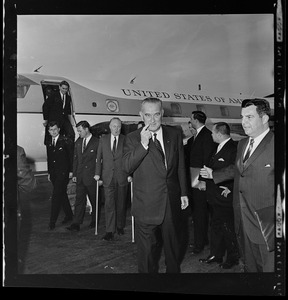 Senator Ted Kennedy, Governor Endicott Peabody, Mayor John F. Collins, and Vice President Lyndon B. Johnson next to Air Force One at Logan Airport