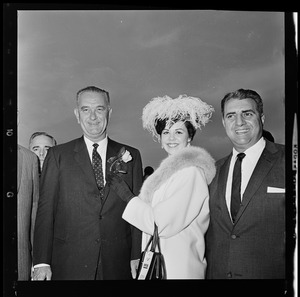 Vice President Lyndon B. Johnson, Miss Massachusetts Marion Sarristo, and Mayor Kuson J. Haddad at Logan Airport