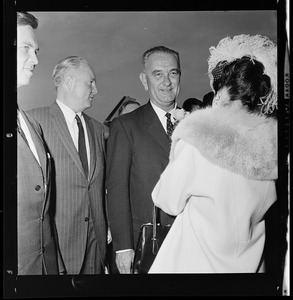 Governor Endicott Peabody, Mayor John F. Collins, Vice President Lyndon B. Johnson, and Miss Massachusetts Marion Sarristo at Logan Airport