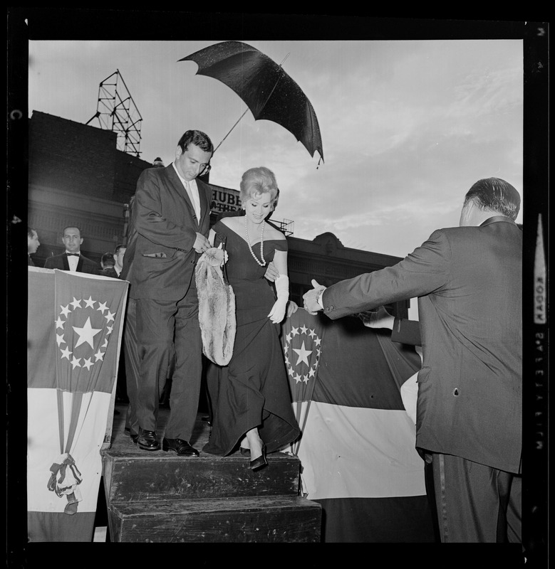 City greeter Robert DeSimone and Zsa Zsa Gabor at opening of the Music Hall Theatre