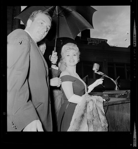 City greeter Robert DeSimone and Zsa Zsa Gabor at opening of the Music Hall Theatre