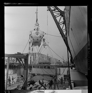 Alvin, a deep submergence research vessel based at Wood's Hole, being hoisted from the U.S.S. San Marcos