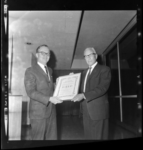 President of MIT Howard Johnson shown presenting the Fourth Underwood-Prescott Memorial Lectureship to Dr. Stanislaw K. Kon, President of The Nutrition Society, London. The presentation was made this evening during the Fourth Annual Dinner which was held at the Museum of Science