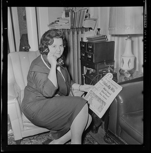 Louise Day Hicks with copy of the Record American announcing her win