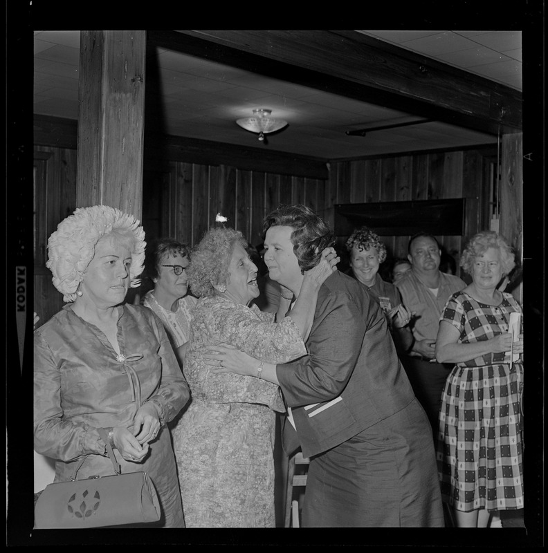 Louise Day Hicks embracing supporter at South Boston Yacht Club campaign headquarters