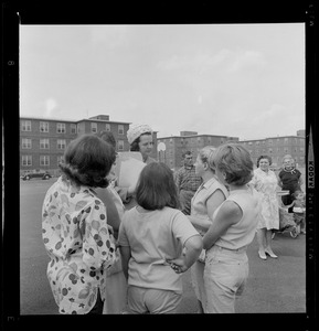 School Committeewoman Louise Day Hicks talks with 100 South Boston mothers after a protest meeting held yesterday at the "D" St. ball ground