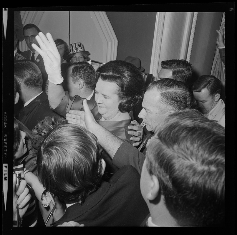 Louise Day Hicks and John Hicks among crowd at campaign headquarters