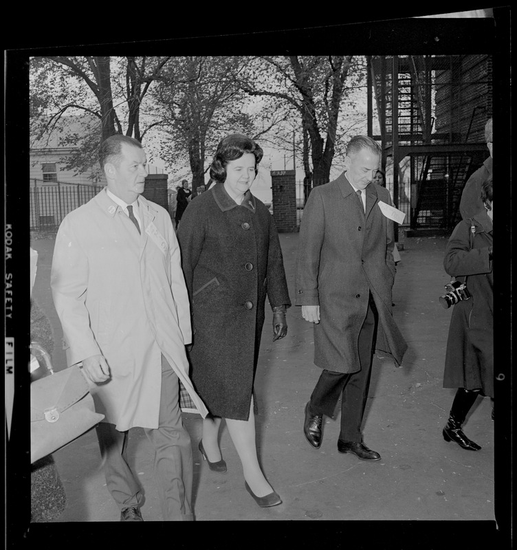 Paul Day, Louise Day Hicks, and John Hicks walking to vote in mayoral election