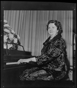 School Committee Chairman Louise Day Hicks at piano