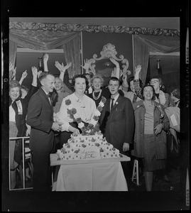 After her overwhelming victory in School Committee fight, Mrs. Louise Day Hicks and husband John, pose with cake at New Boston Club