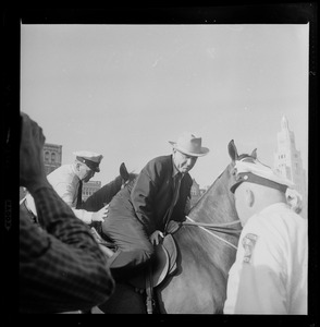 Senator Lyndon Johnson on horse in Boston
