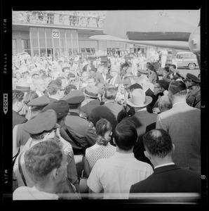 Senator Lyndon Johnson met by crowd at Logan Airport