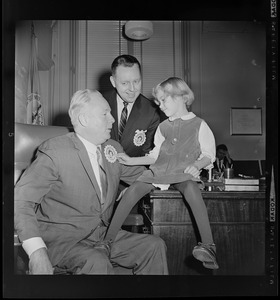 Cerebral palsy poster girl, Karen Kawecki greets Boston's Mayor John Collins in connection with the CP Drive. Herb Connolly, President of the Greater Boston Cerebral Palsy Association looks on