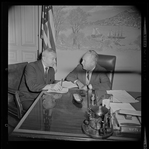Boston Mayor John Collins in his office with unidentified man