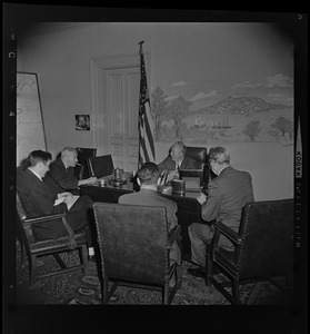Boston Mayor John Collins in his office with unidentified men