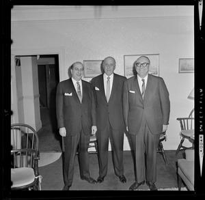 Harold G. Kern, center, with two unidentified men at party in his honor