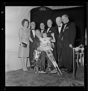 Mary Collins, Sheriff Howard W. Fitzpatrick, Mayor John Collins, Rubin Epstein, Elizabeth Bradley, unidentified man, William R. Coleman, and Leo F. Dunphy at March of Dimes donor dinner