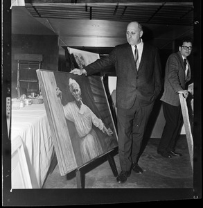 Unidentified man with painting at 37th Annual Exhibition of Paintings by Contemporary New England Artists