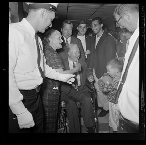 Mayor John F. Collins is warmly greeted at Logan International Airport, East Boston, on his return from Houston, Tex., where he was elected president of American Municipal Assn.
