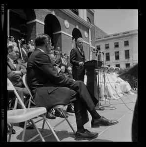Unidentified man speaks outside the State House during a memorial service for those lost aboard the submarines USS Scorpion and USS Thresher and Robert Kennedy