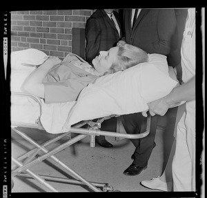 Marvella Hern Bayh leaving the hospital on a stretcher