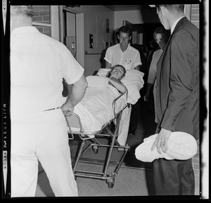 Marvella Hern Bayh leaving the hospital on a stretcher