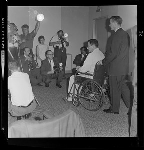 Sen. Birch Bayh, with Dr. David Jackson, talking to reporters and photographers at press conference