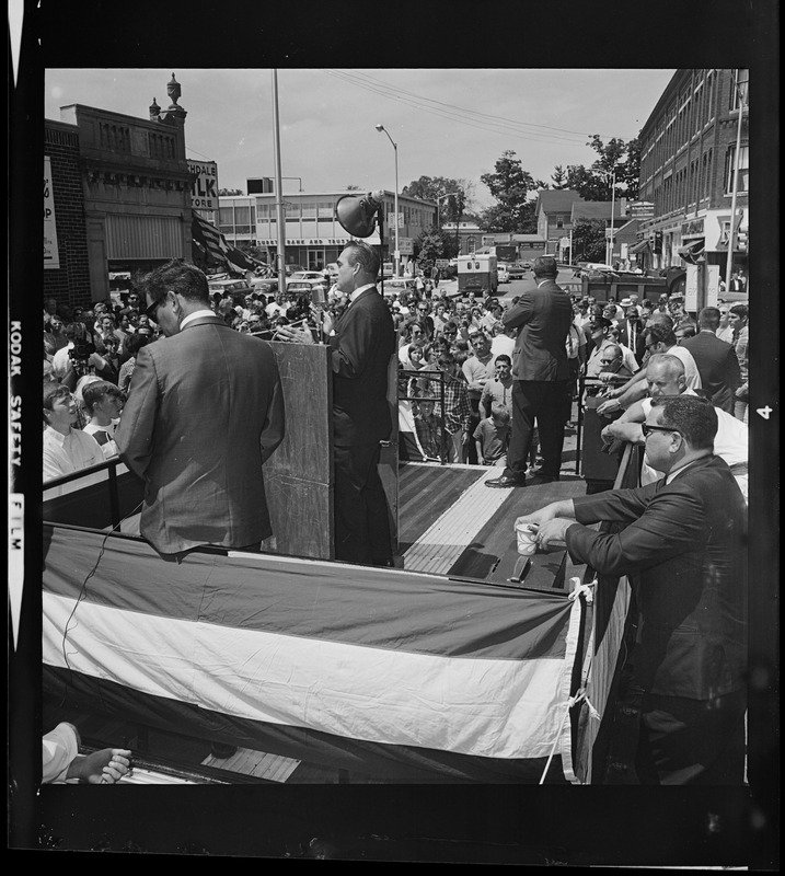 George Wallace speaking from podium at outdoor campaign rally