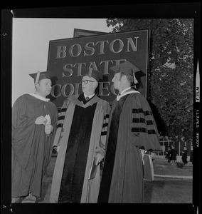 Dr. John J. O'Neill with two other men in academic regalia in front of Boston State College sign