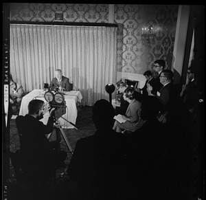 Mayor John F. Collins holding press conference at the Sheraton-Plaza Hotel