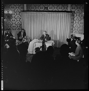 Mayor John F. Collins holding press conference at the Sheraton-Plaza Hotel