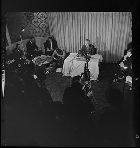 Mayor John F. Collins holding press conference at the Sheraton-Plaza Hotel