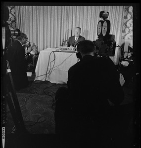 Mayor John F. Collins holding press conference at the Sheraton-Plaza Hotel