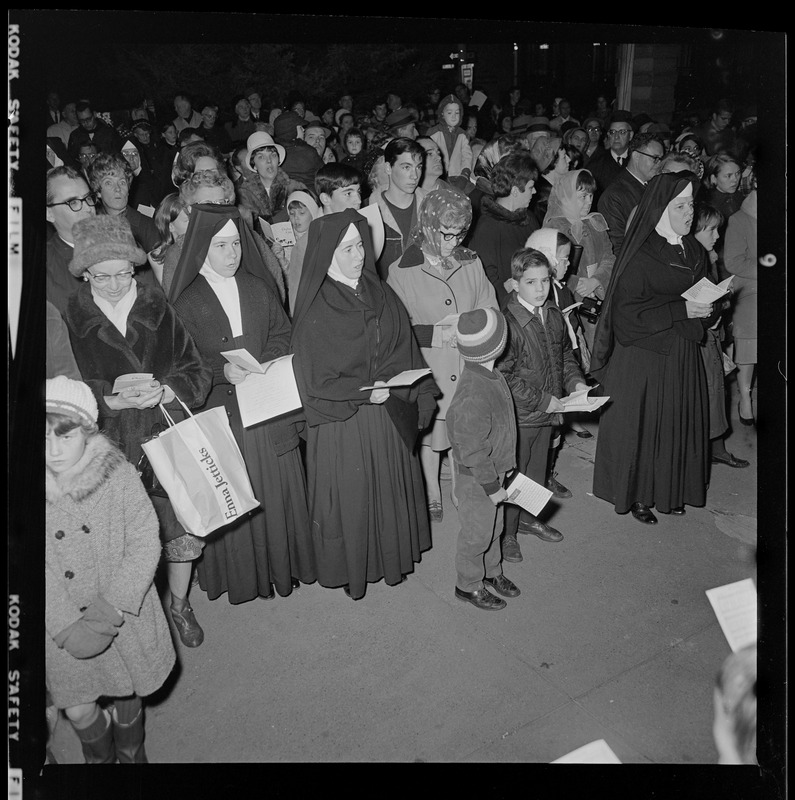 People singing at City Hall Christmas lighting ceremony