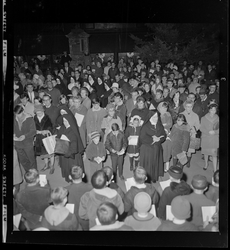 People singing at City Hall Christmas lighting ceremony