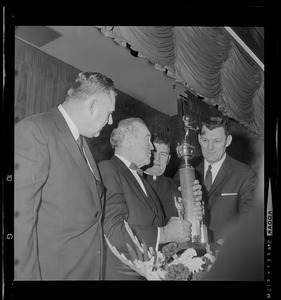 John Yauckoes, Frank Leahy, Msgr. George Kerr, and Chet Gladchuk at dinner in honor of the 1941 Boston College Sugar Bowl team