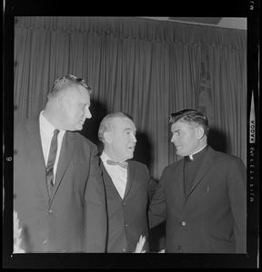 John Yauckoes, Frank Leahy, and Msgr. George Kerr at dinner in honor of the 1941 Boston College Sugar Bowl team