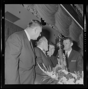 John Yauckoes, Frank Leahy, Msgr. George Kerr, and Chet Gladchuk at dinner in honor of the 1941 Boston College Sugar Bowl team