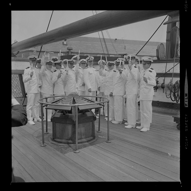 Rear Admiral Joseph C. Wylie with 16 Tufts ROTC graduates